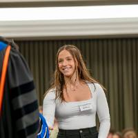 walking to get award from dean of major